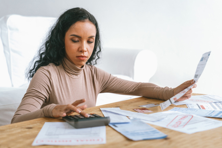 woman calculating budget